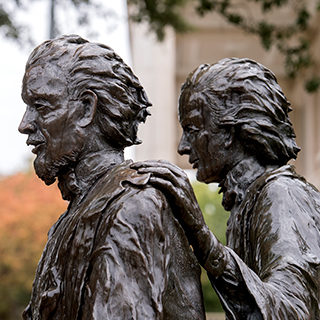A bronze statue of ɫ founders Addison and Randolph Clark